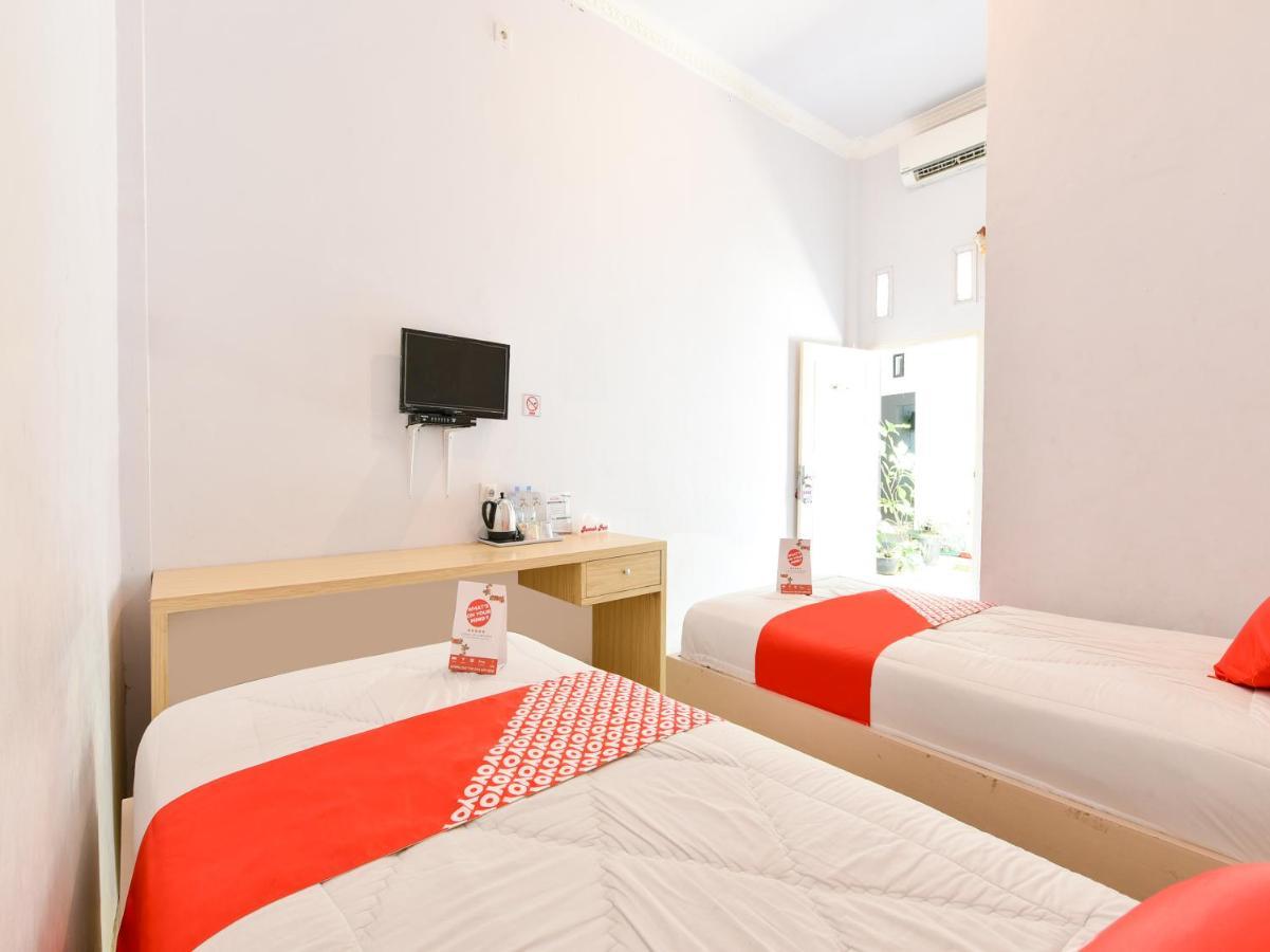 Oyo 1074 Homestay Rumah Puti Painan Exterior foto